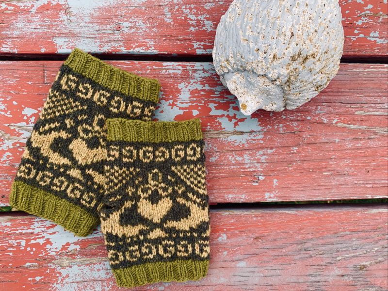 Colorful woven textiles and spools of thread - showcasing handmade fiber arts and sacred craft